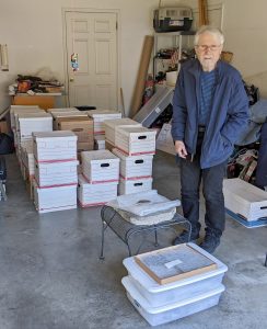 Dr. Ron Buta with the new donation of Crescent Valley Mine fossils in his garage. Photo: Adiel Klompmaker